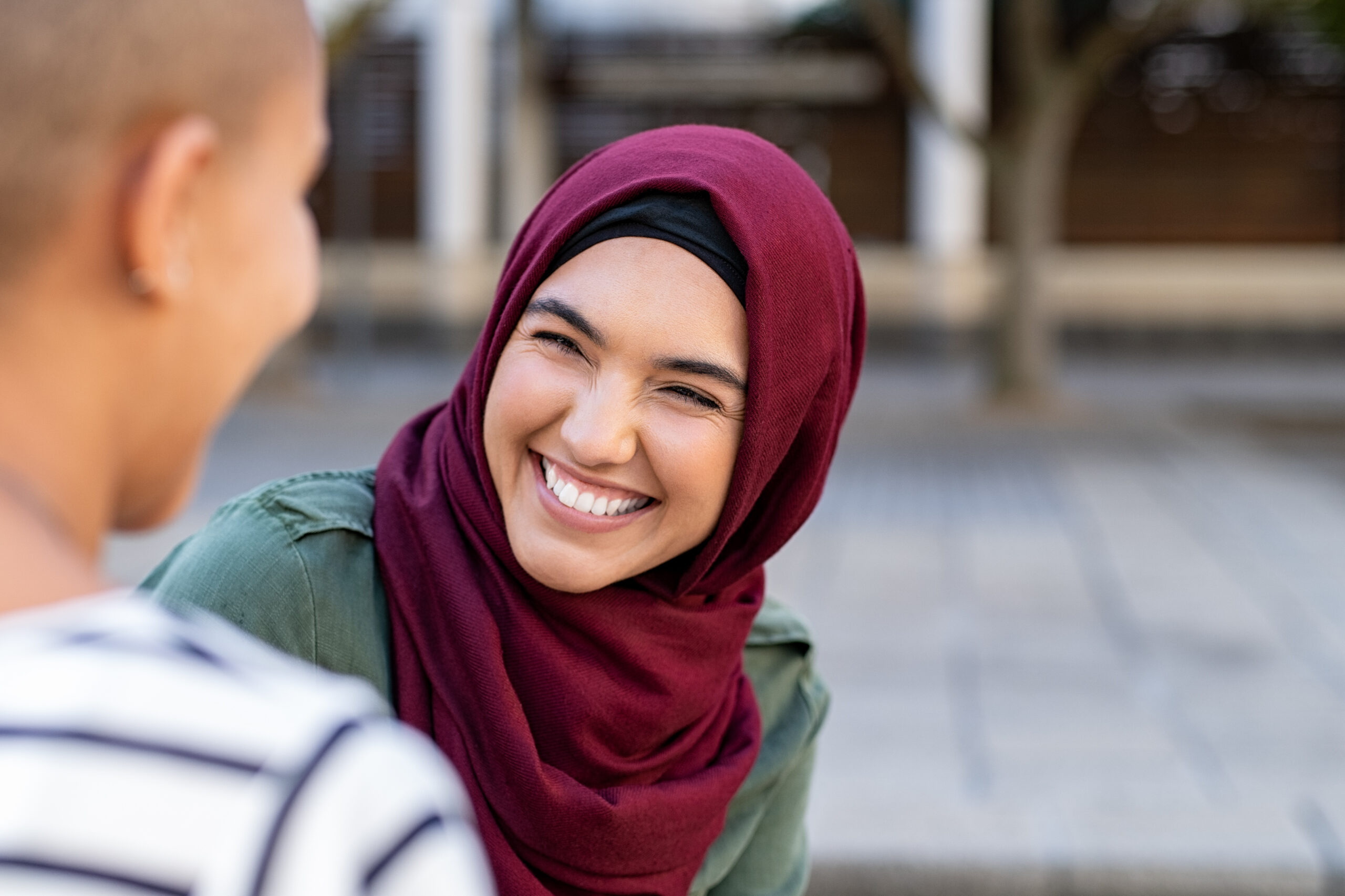 Multiethnic friends in conversation